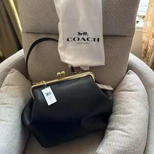 Coach Black Leather Shoulder Bag with Gold Accents